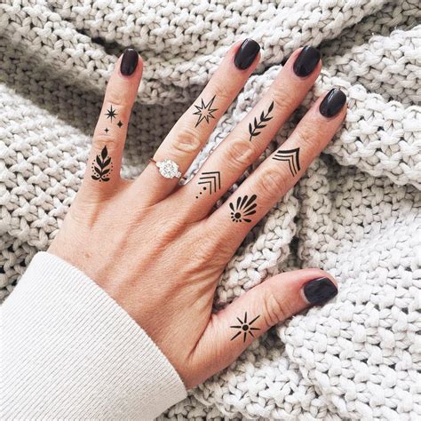 cool finger tattoos|feminine finger tattoos.